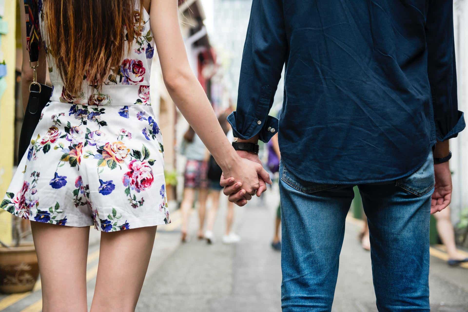 Woman And Man Holding Hands